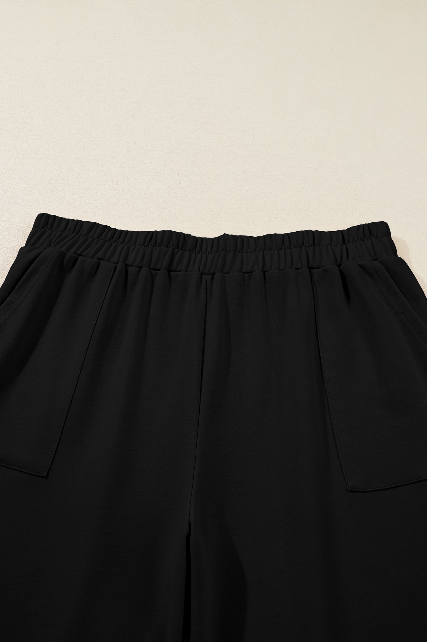 Black Plus Size Elastic Waist Asymmetrical Loose Capris Pants
