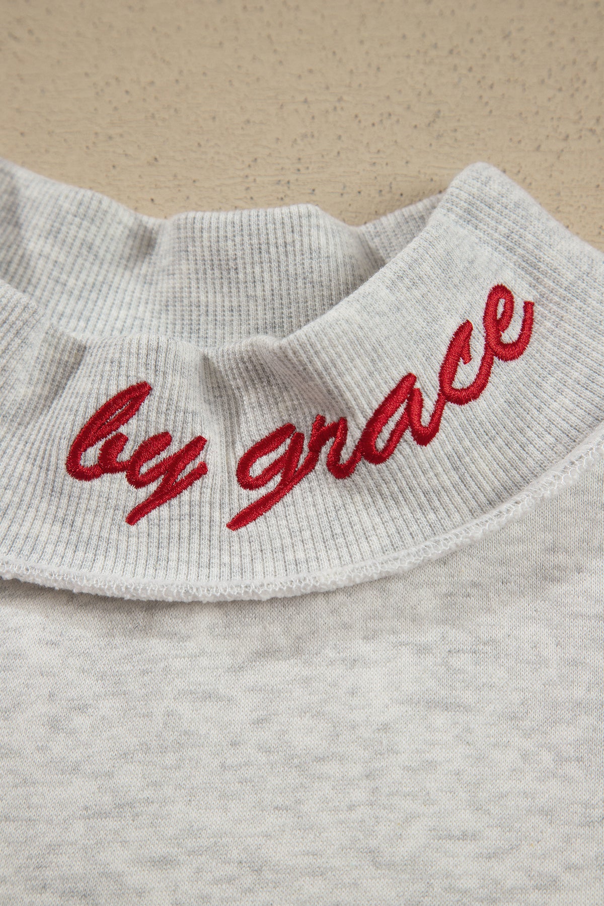 Saved By Grace Embroidered Mock Neck Sweatshirt