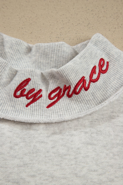Saved By Grace Embroidered Mock Neck Sweatshirt