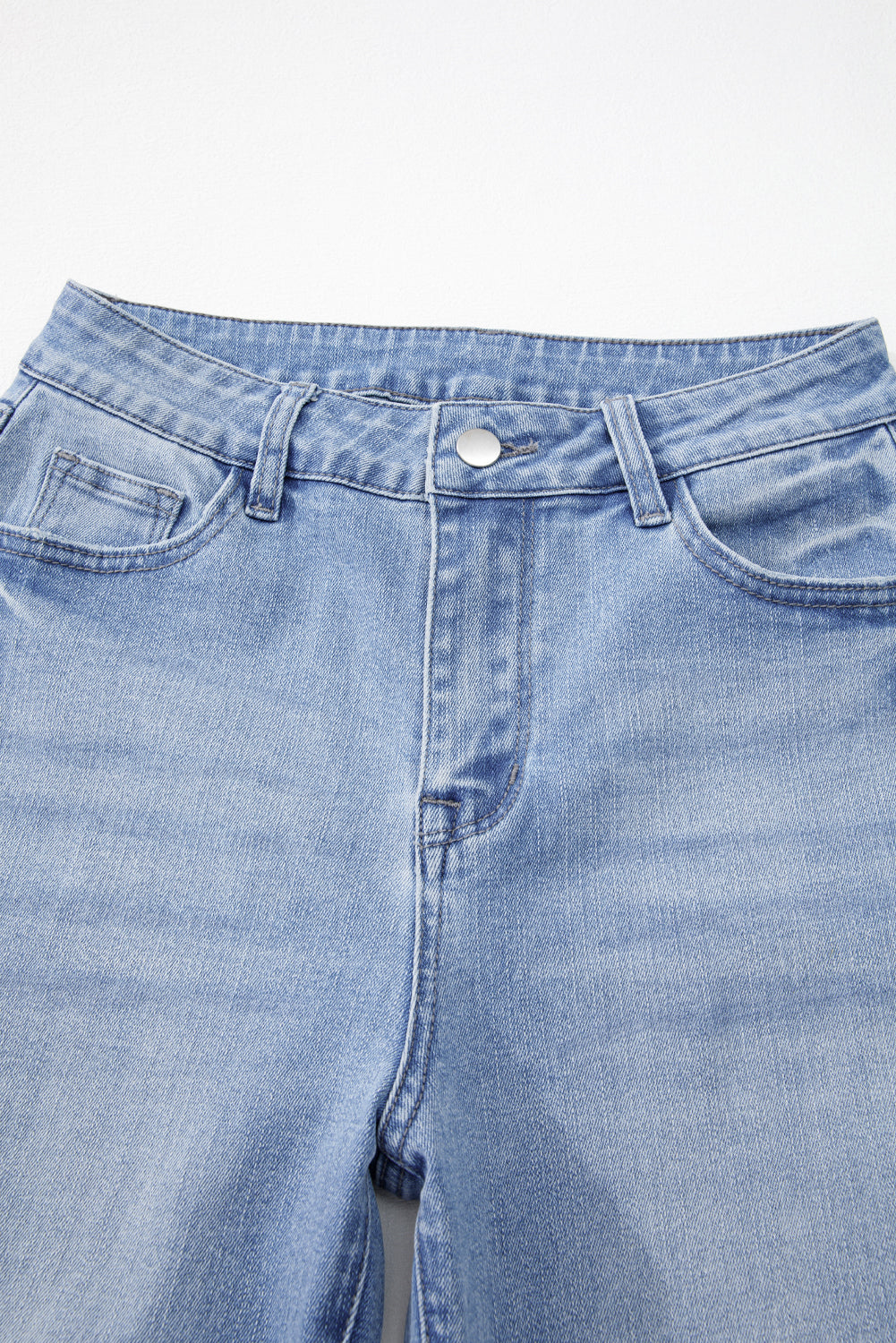 High Waist Flared Jeans with Raw Hem