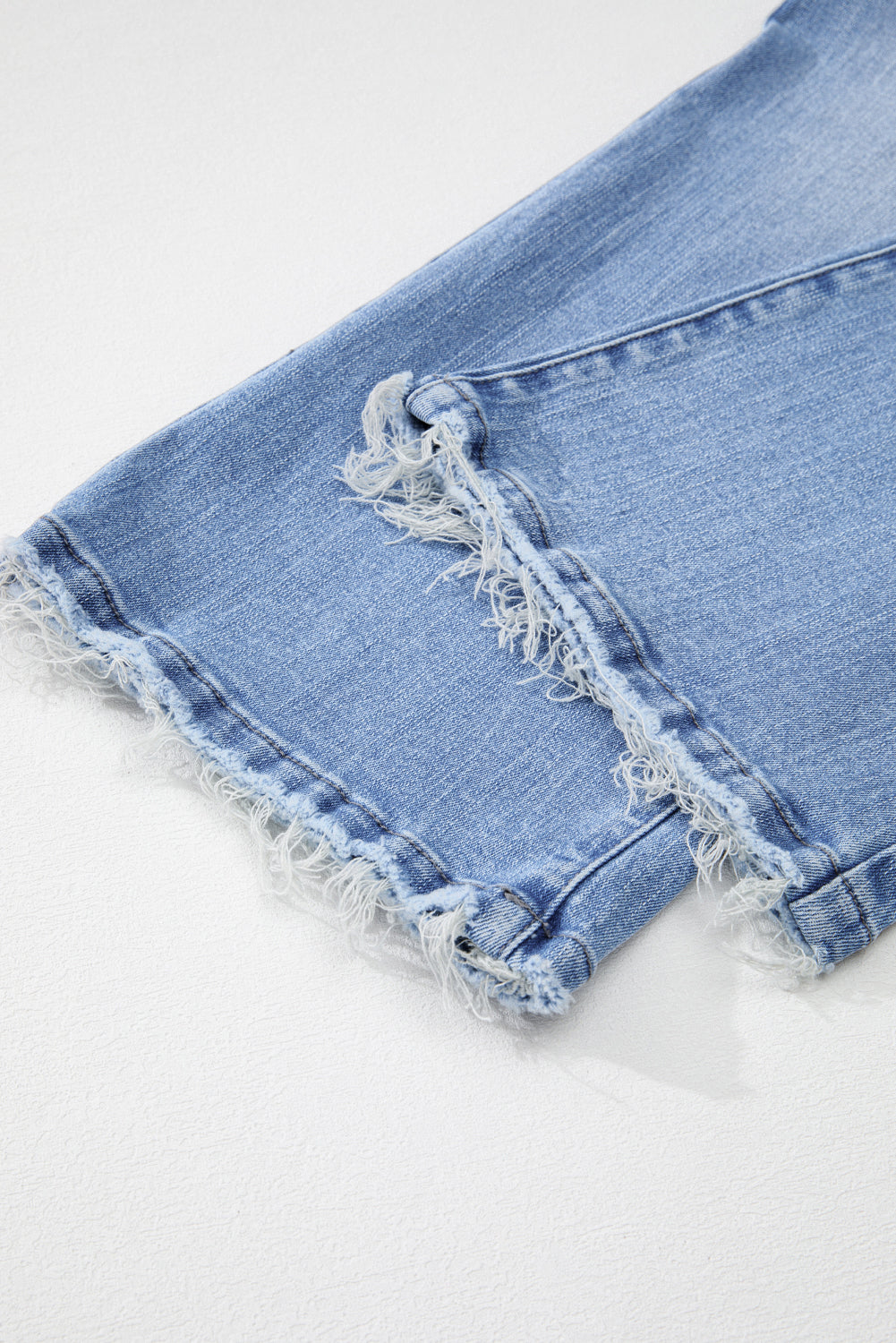 High Waist Flared Jeans with Raw Hem