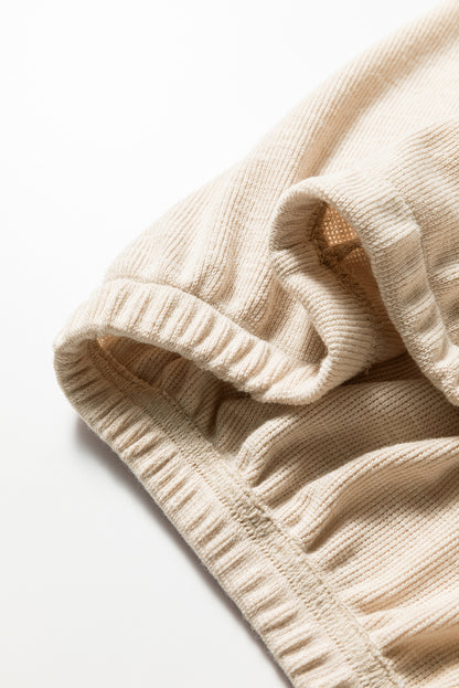 Jet Stream Textured Pleated Drop Shoulder Long Sleeve Knit Top