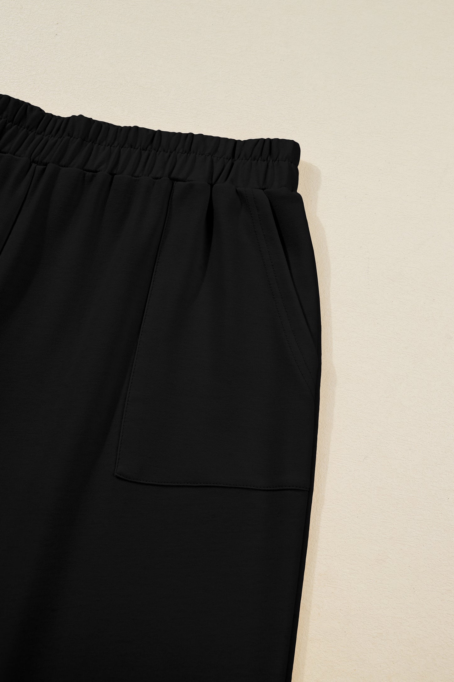 Black Plus Size Elastic Waist Asymmetrical Loose Capris Pants
