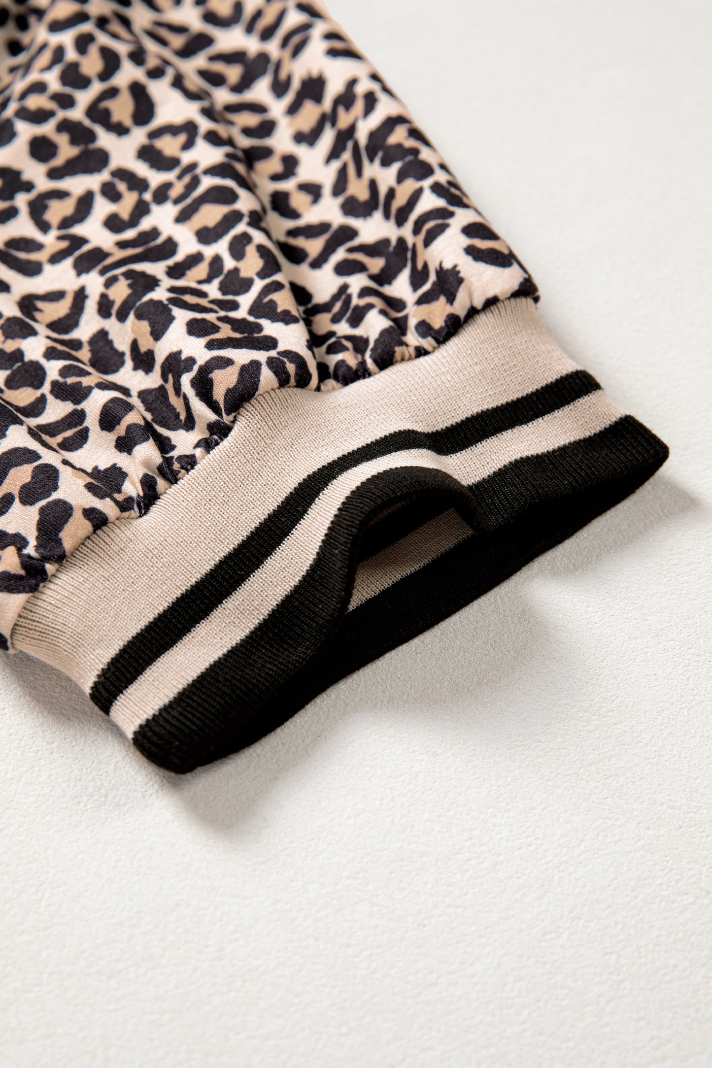 Women’s Leopard Print Half Zip Stripe Trim Top