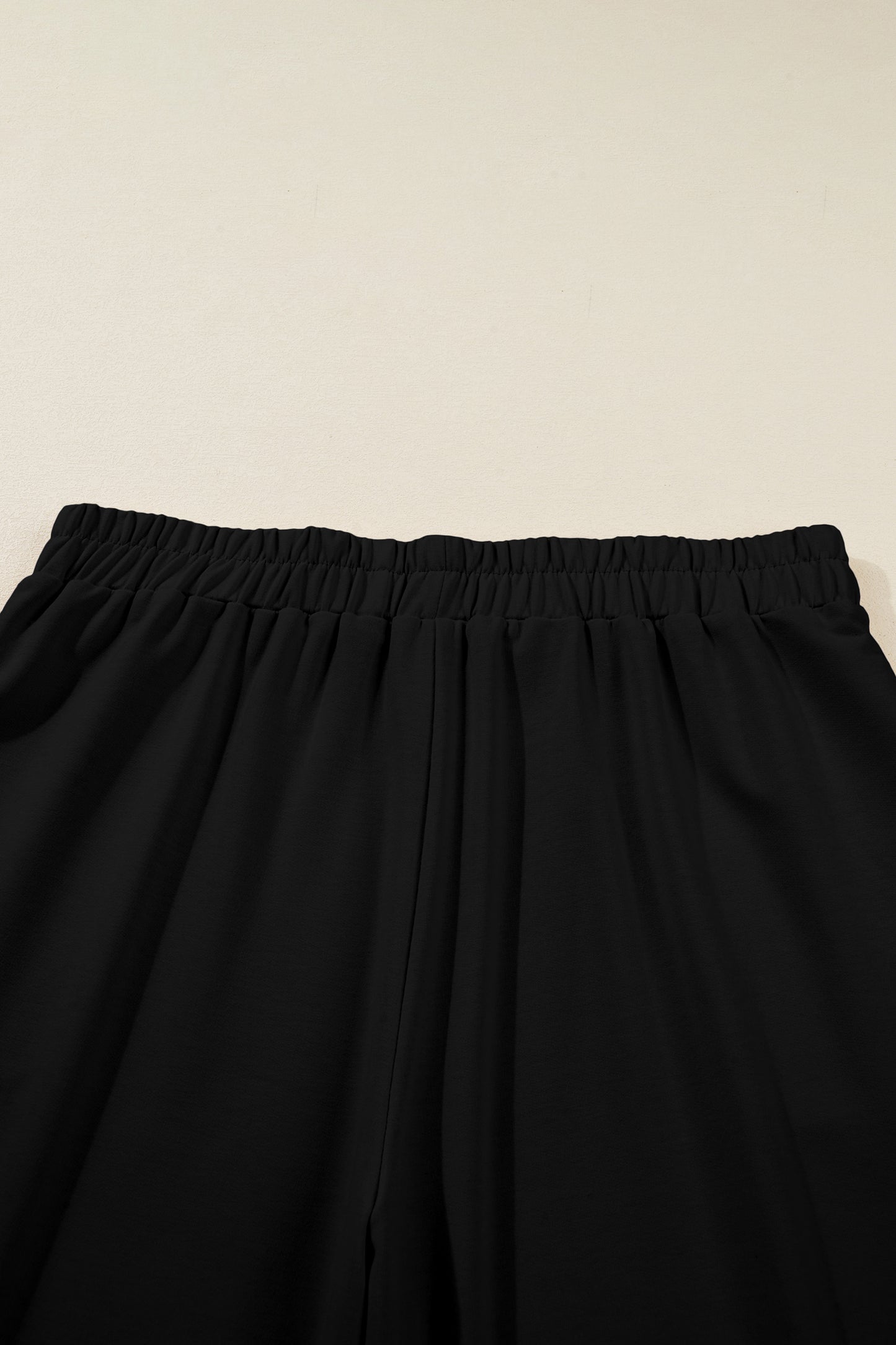 Black Plus Size Elastic Waist Asymmetrical Loose Capris Pants