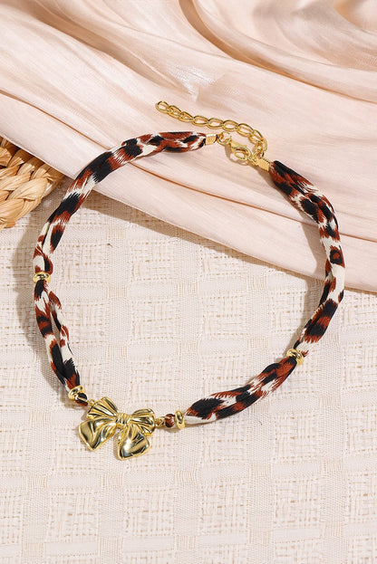 Gold Plated Bow Charm Leopard Ribbon Necklace