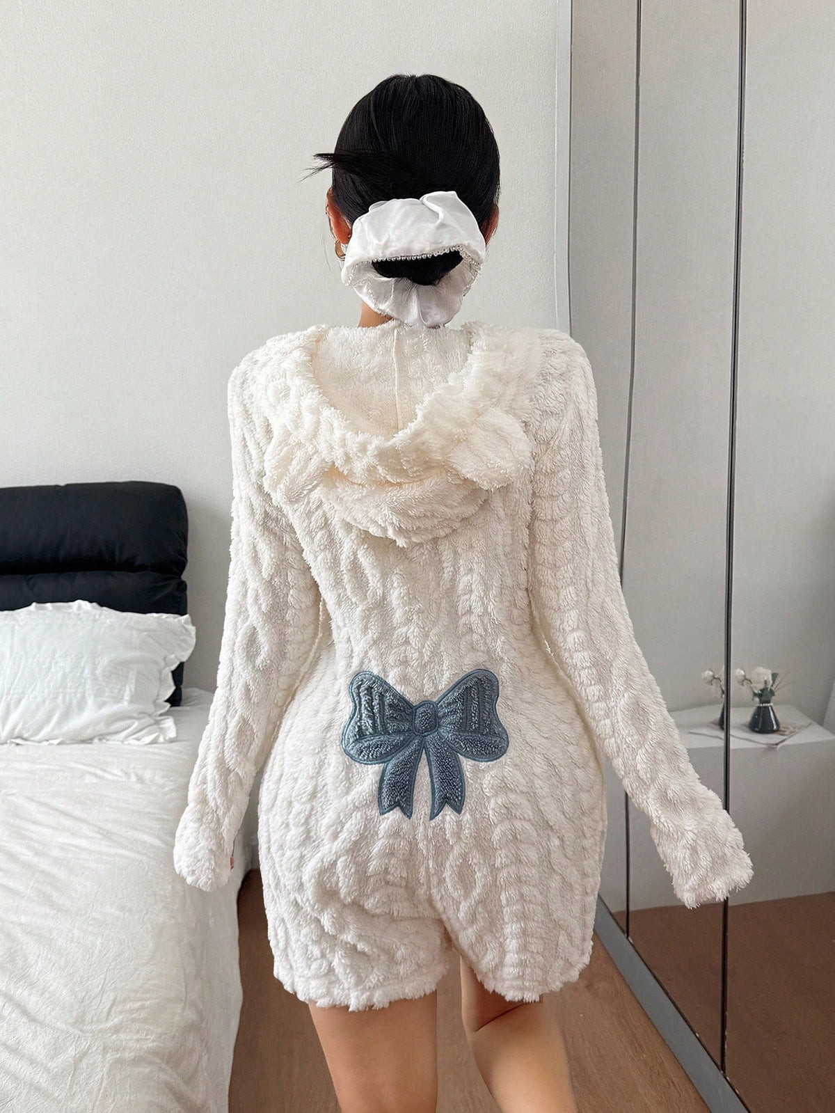 Women's Fuzzy Hooded Sherpa Romper with Bow Back