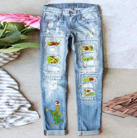 Women’s Light Wash Ripped Jeans with Christmas Grinch Patches