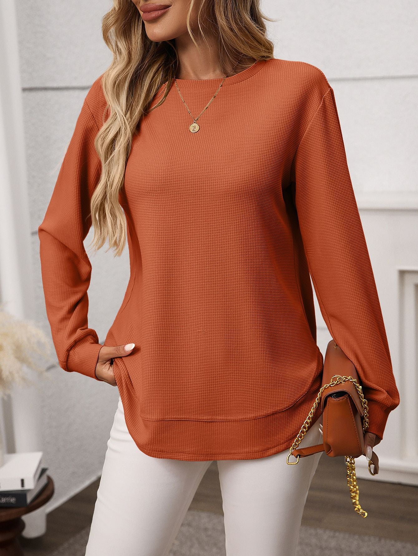 Solid waffle knit tunic top layered curved hem