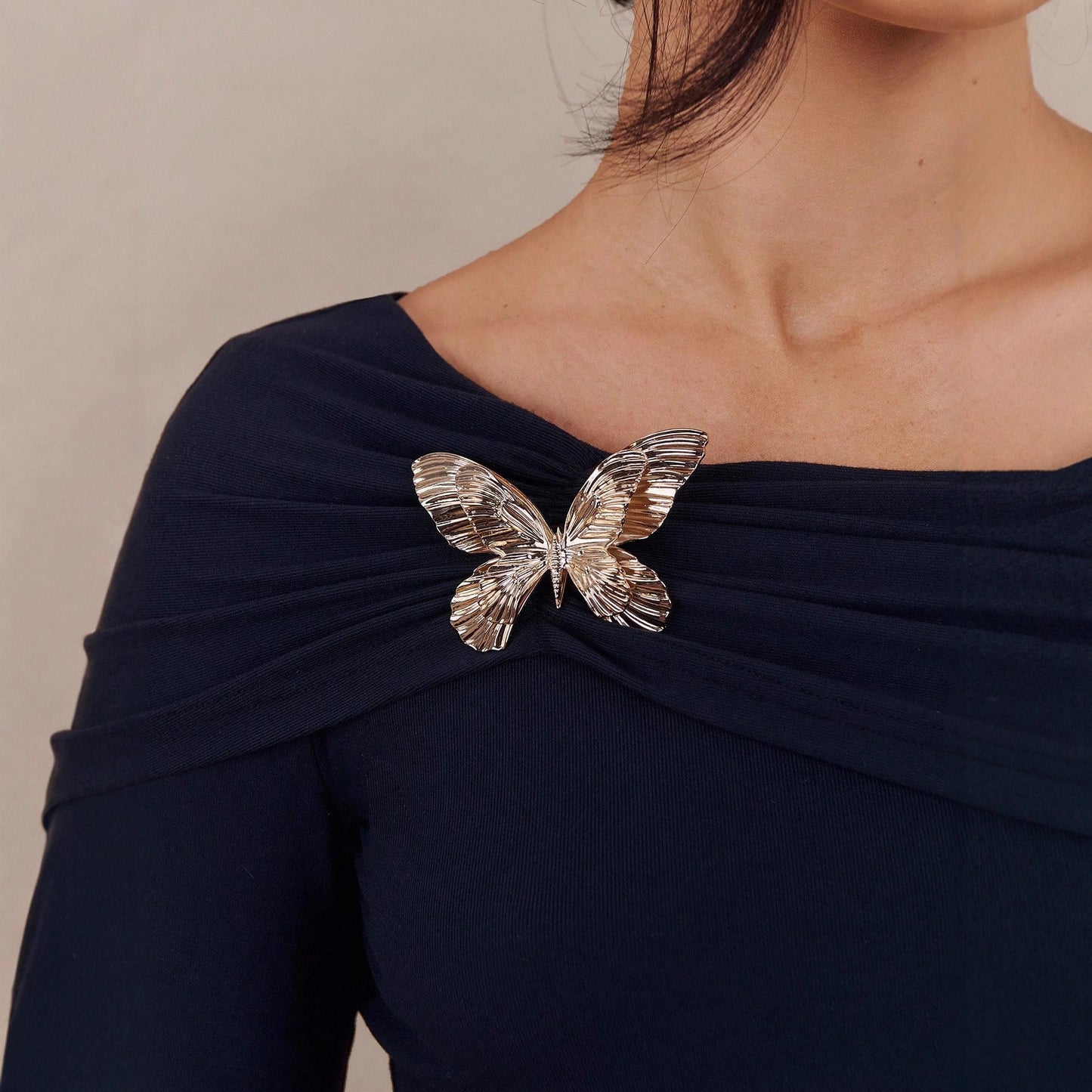 Off Shoulder Ruched Long Sleeve Top with Butterfly Brooch