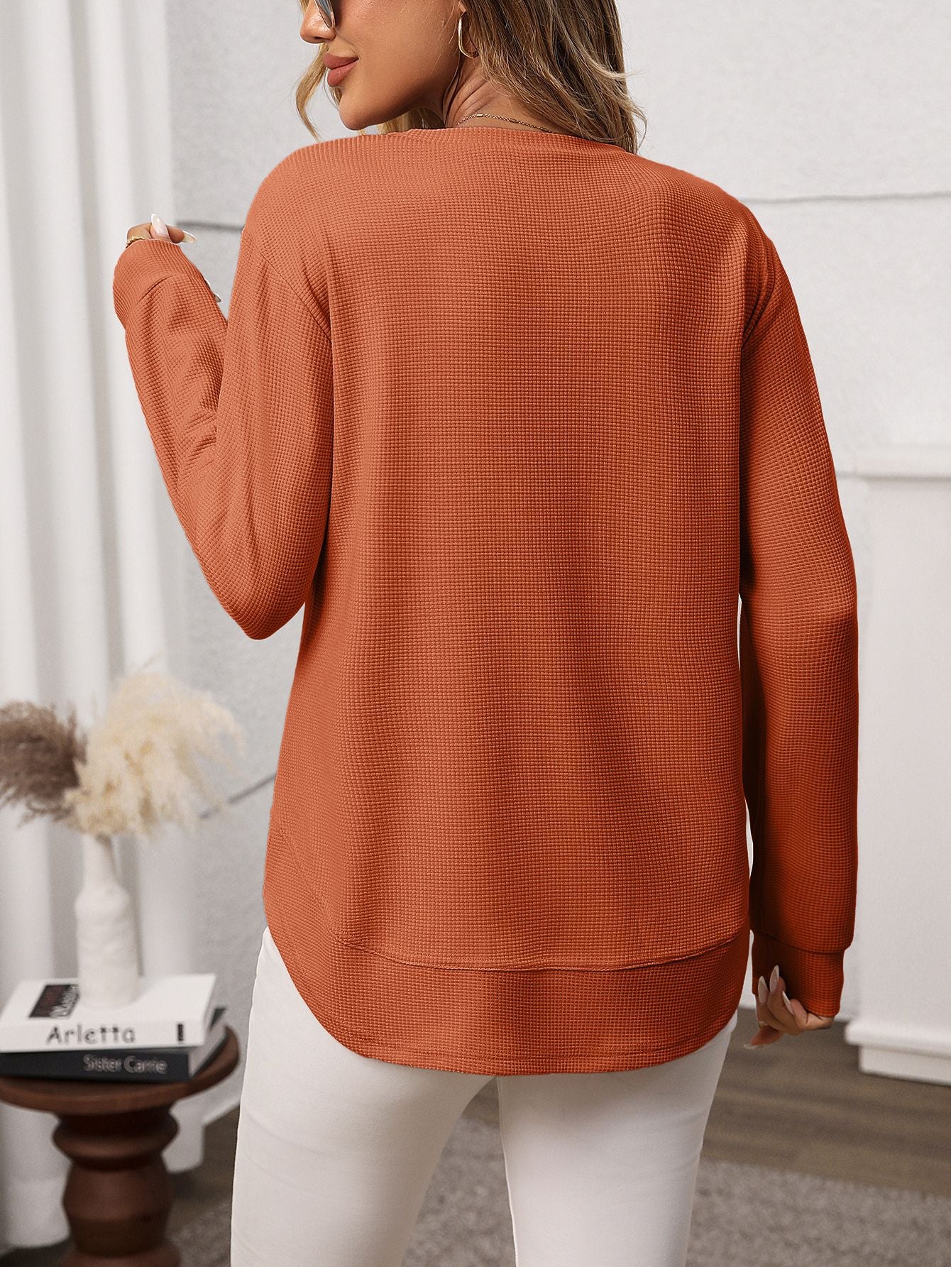 Solid waffle knit tunic top layered curved hem
