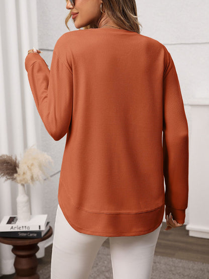 Solid waffle knit tunic top layered curved hem