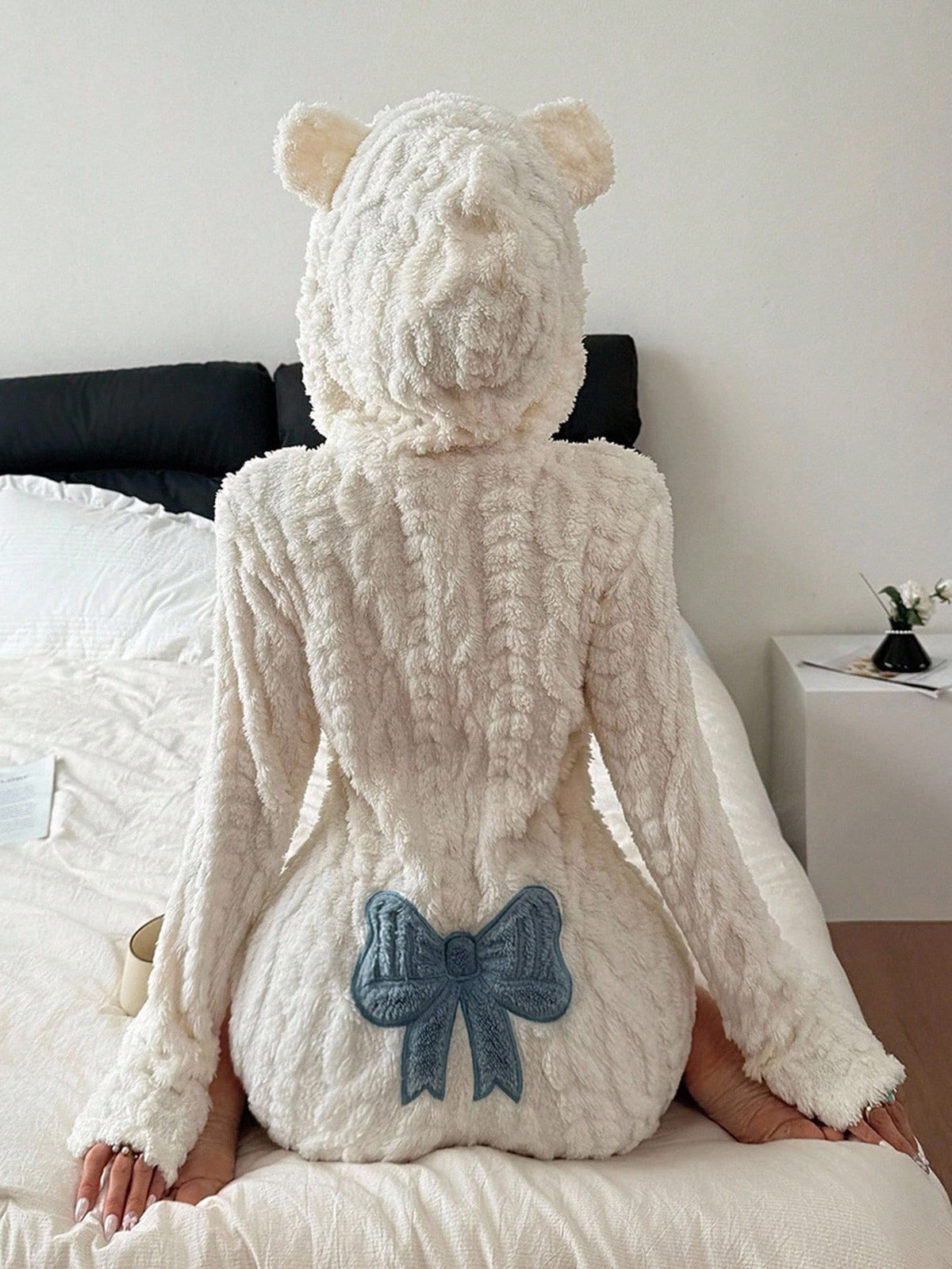 Women's Fuzzy Hooded Sherpa Romper with Bow Back