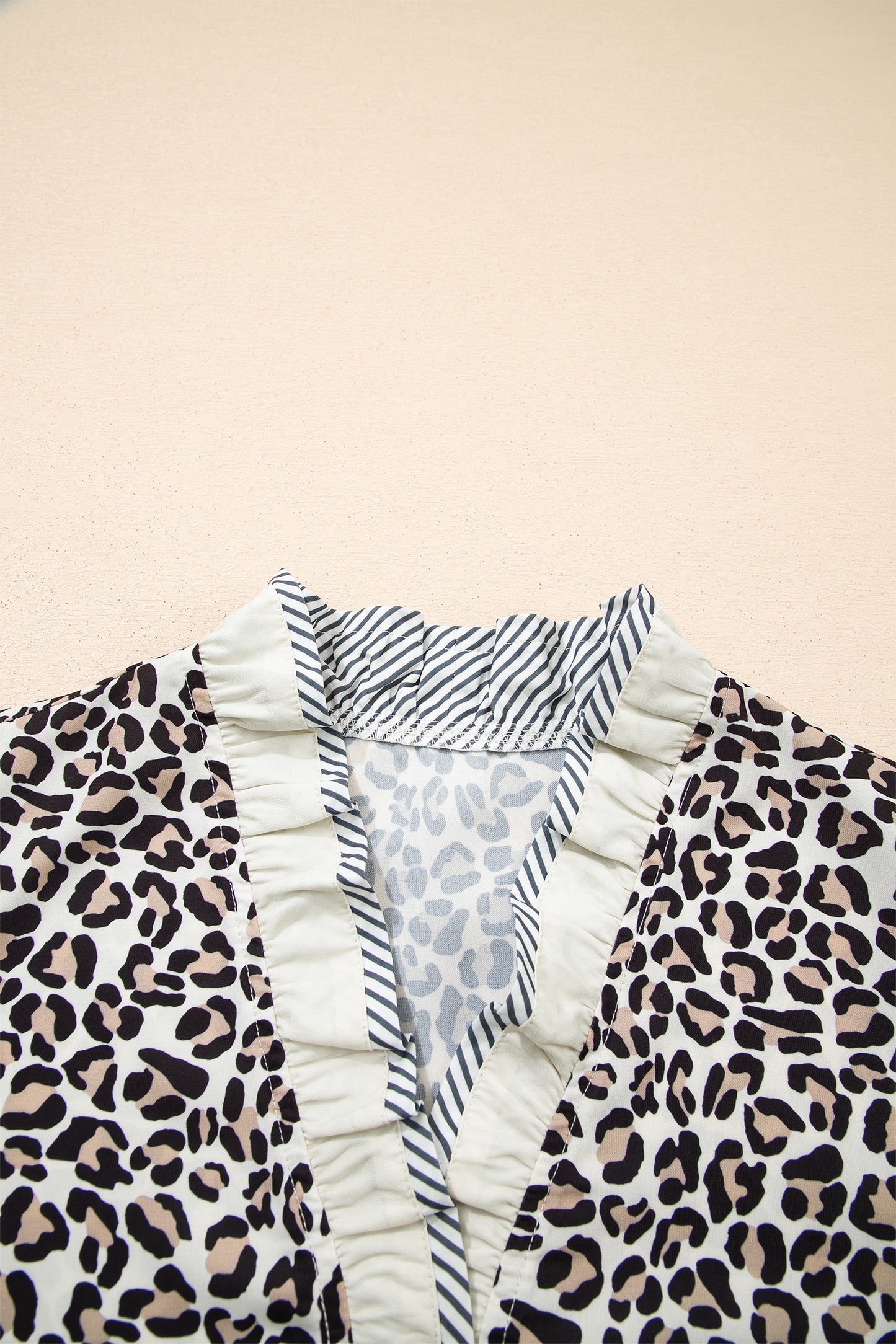 Leopard Print V Neck Blouse with Striped Ruffle Trim