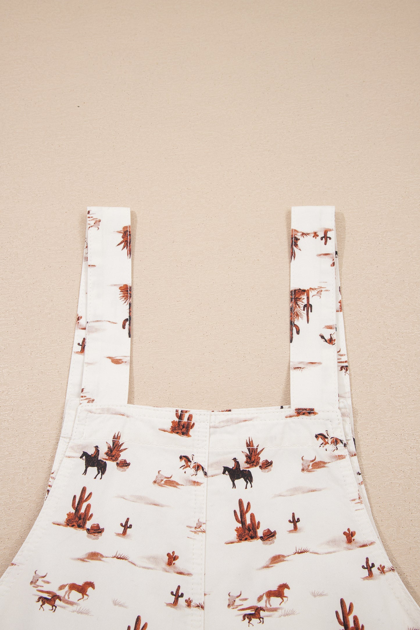 Beige Western Print Adjustable Strap Loose Cotton Jumpsuit