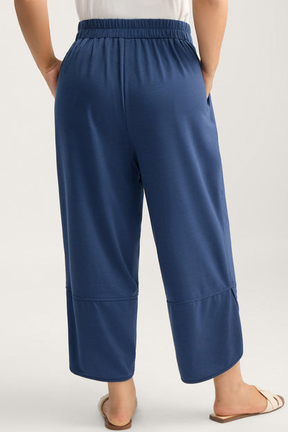 Black Plus Size Elastic Waist Asymmetrical Loose Capris Pants