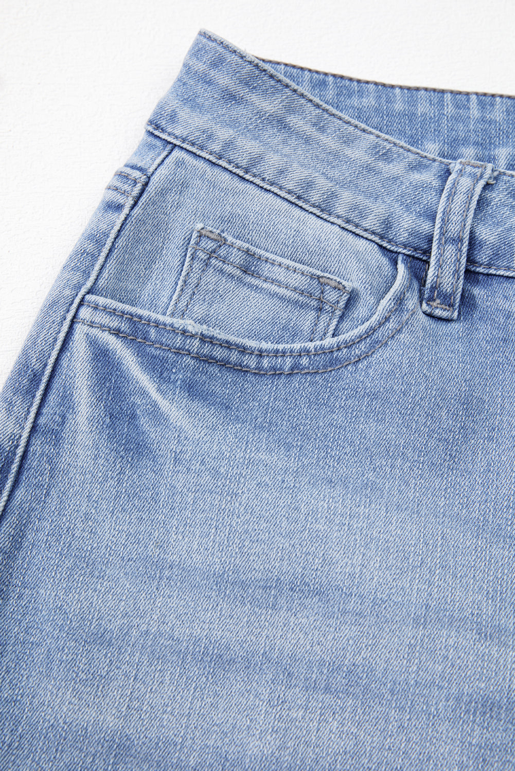 High Waist Flared Jeans with Raw Hem